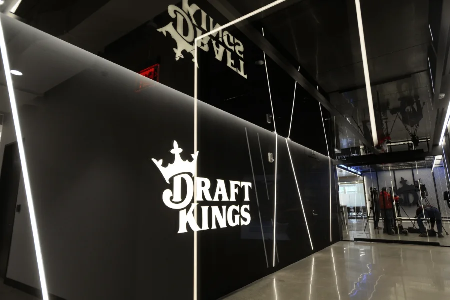 DraftKings Faces Revenue Dip While Betting Activity Rises Amid Predictions Expansion
